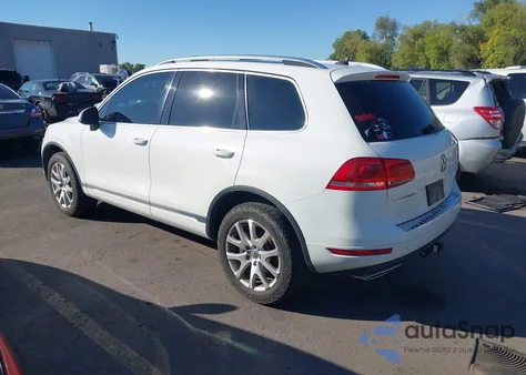 2014 Volkswagen Touareg Tdi Lux z USA, uszkodzony, nr VIN WVGEP9BPXED012958